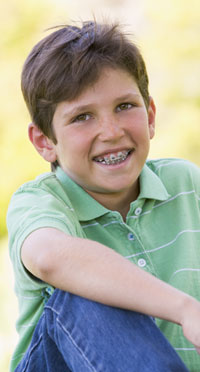 smiling boy with braces